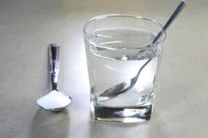 gargle with salty water after tooth extraction to manage pain