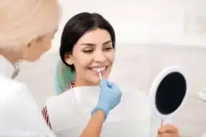 A dentist with her patient