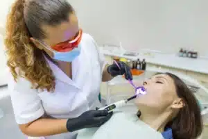 A female dentist with patient