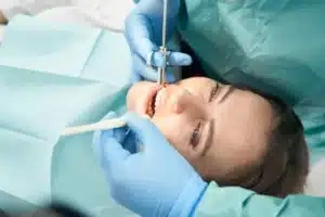 A woman receiving dental treatment