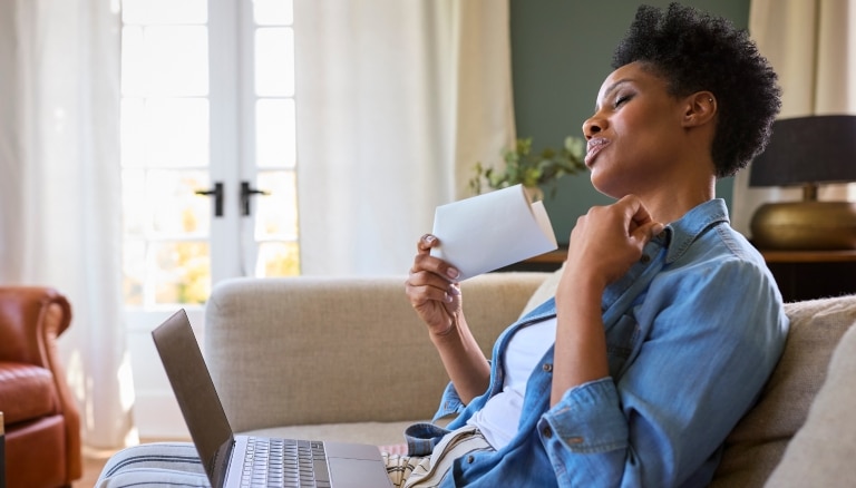 woman experiencing hot flash